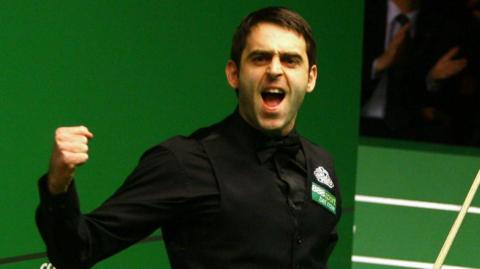 Ronnie O'Sullivan celebrates making a 147 break at the World Championship in April 2008, clenching his right fist and shouting out in delight